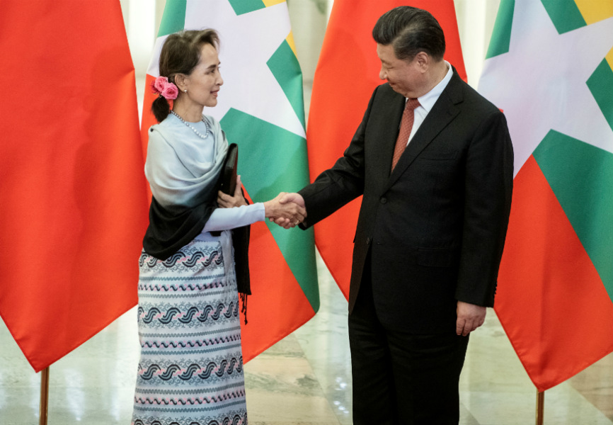 Myanmar State Counselor Aung San Suu Kyi and Chinese President Xi Jinping. REUTERS.