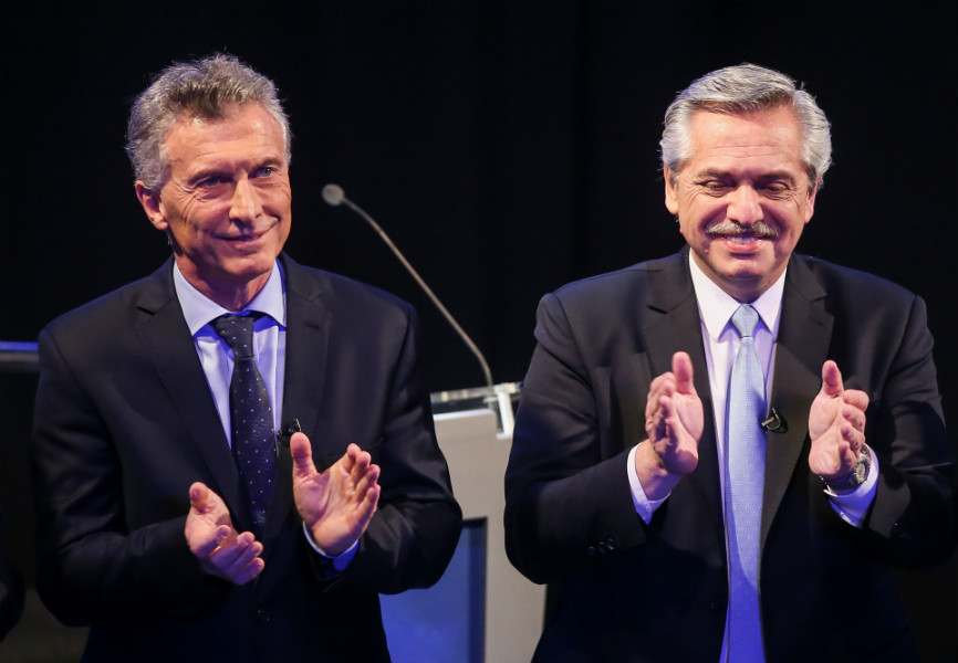 Argentine President Mauricio Macri and presidential candidate Alberto Fernandez after a debate. REUTERS.