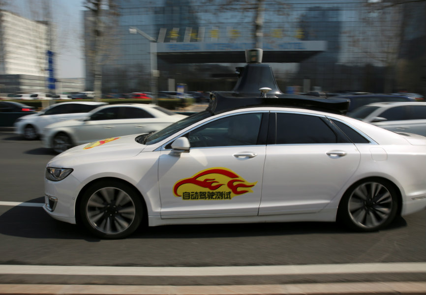 Baidu's Apollo autonomous vehicle during a public road test for self-driving vehicles in Beijing. REUTERS.