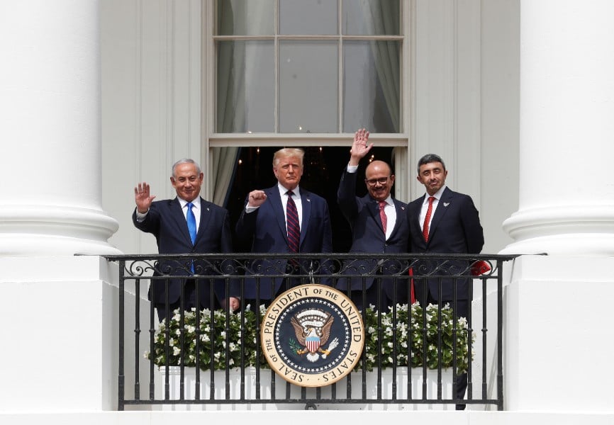 Israeli Prime Minister Benjamin Netanyahu, US President Donald Trump, Bahrain Foreign Minister Abdullatif Al Zayani, and United Arab Emirates Foreign Minister Abdullah bin Zayed at the White House following a signing ceremony for the Abraham Accords, normalizing relations between Israel and Bahrain and the United Arab Emirates. REUTERS.