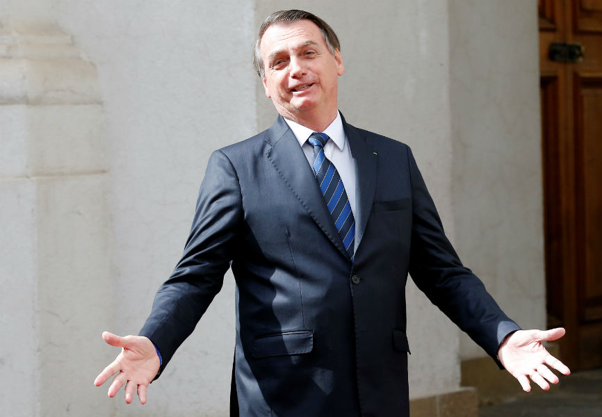 Brazilian President Jair Bolsonaro meets Chilean President Sebastian Pinera in Santiago. REUTERS.