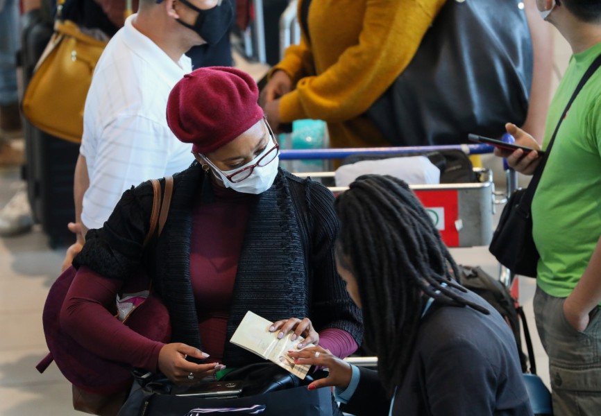 A passenger at Cape Town International Airport in South Africa during the coronavirus pandemic. REUTERS.