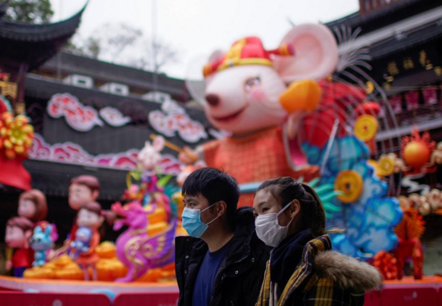 People in Shanghai wearing masks during the Chinese Lunar New Year holiday as the country grapples with the coronavirus outbreak. REUTERS.