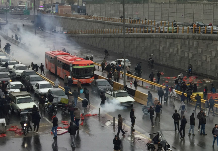 Iranians in Tehran protest against a gas price increase. REUTERS.