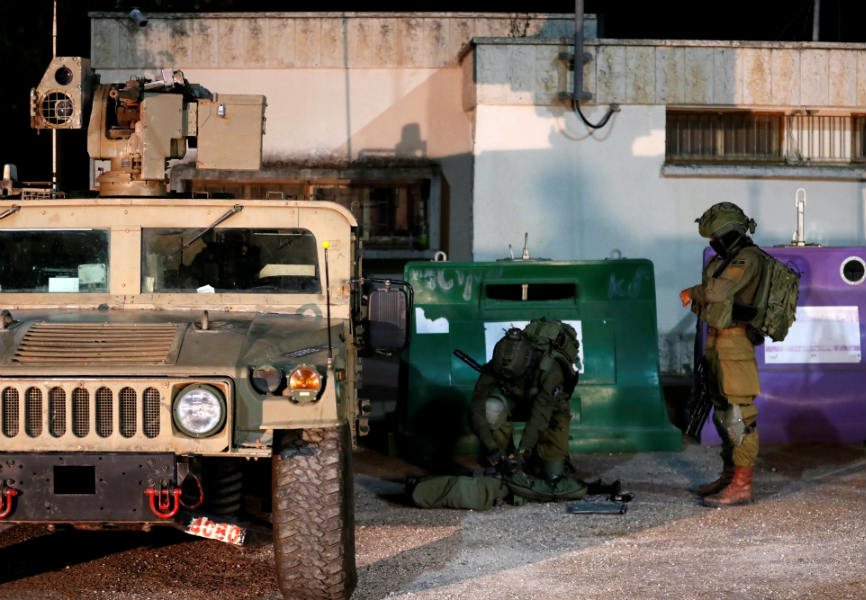 Israeli troops near the Israel-Lebanon border. REUTERS.
