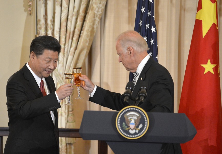 Former US Vice President Joe Biden and Chinese President Xi Jinping at a 2015 US State Department luncheon. REUTERS.