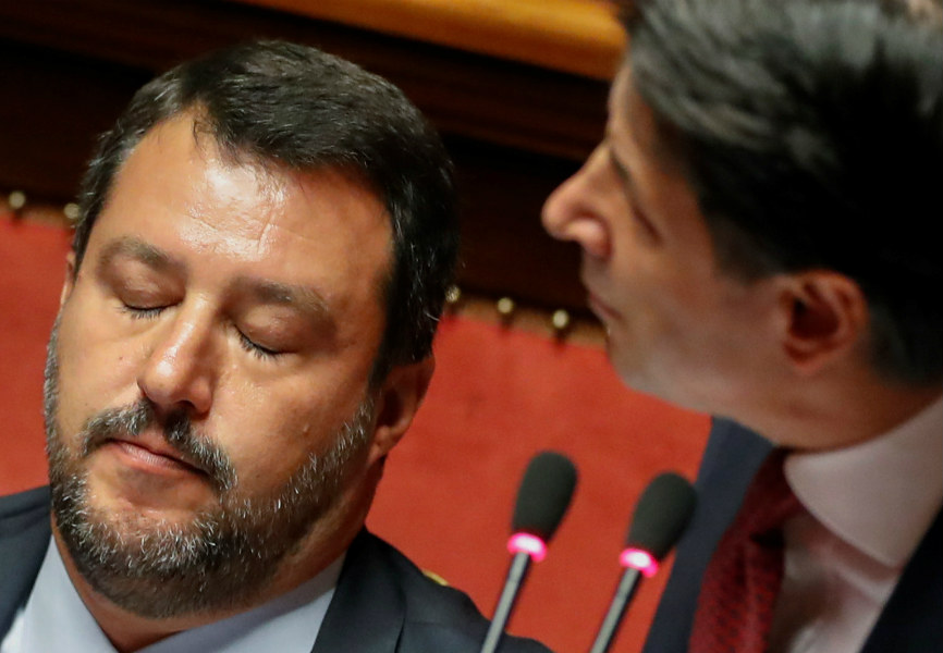 Matteo Salvini listens as Italian Prime Minister Giuseppe Conte addresses parliament. REUTERS.