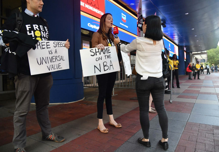 Protesters supporting Hong Kong demonstrate outside an NBA pre-season game between the Washington Wizards and Guangzhou Loong Lions. USA TODAY Sports.