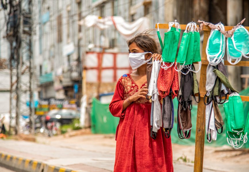 A woman with face masks on the streets of Islamabad after the coronavirus outbreak in Pakistan. REUTERS.