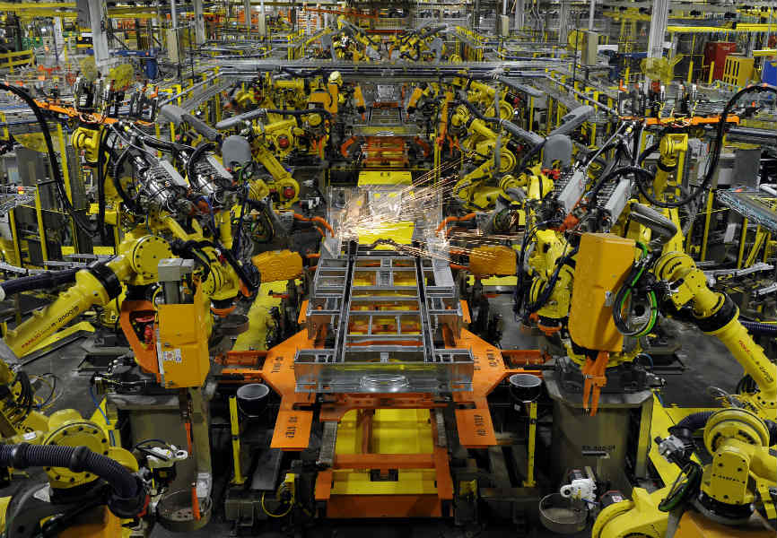 Robotic arms at a Ford assembly plant in Missouri. REUTERS.