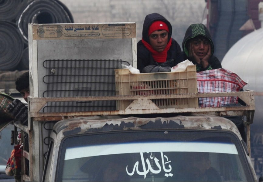 Displaced Syrian boys in Idlib. REUTERS.