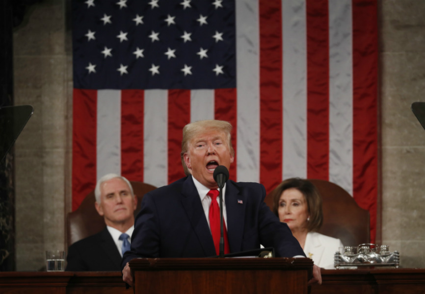 US President Donald Trump, Speaker of the House Nancy Pelosi, and Vice President Mike Pence at the 2020 State of the Union. REUTERS.