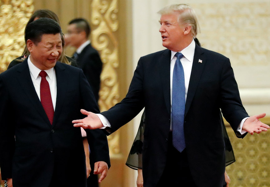 US President Donald Trump and Chinese President Xi Jinping arrive for a state dinner at the Great Hall of the People in Beijing, China, November 9, 2017. REUTERS.