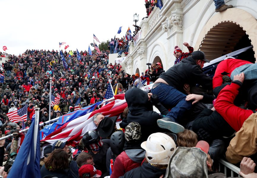 Supporters of US President Donald Trump storm the US Capitol on 6 January 2020. REUTERS.